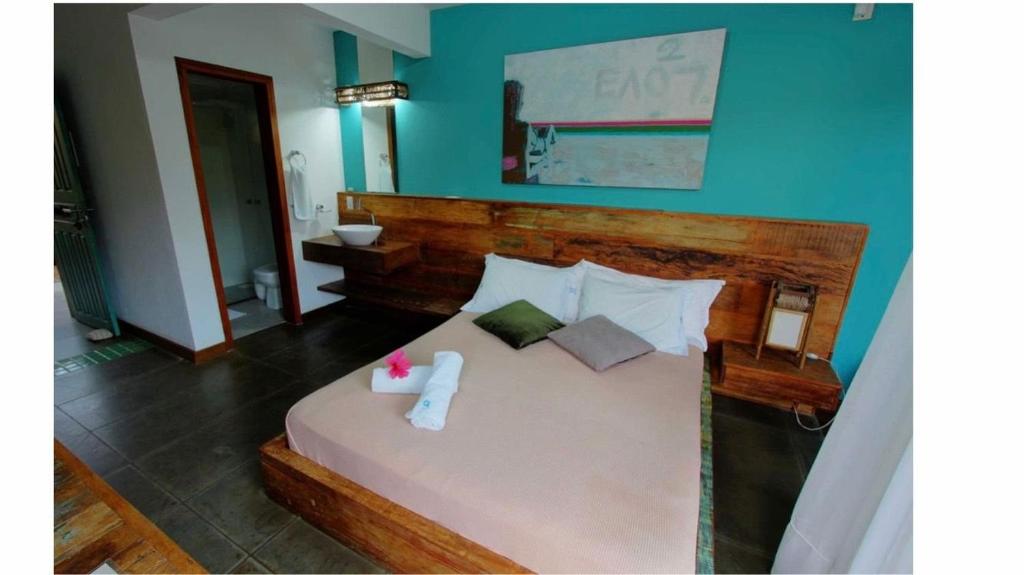 Cama ou camas em um quarto em Pousada Arágua