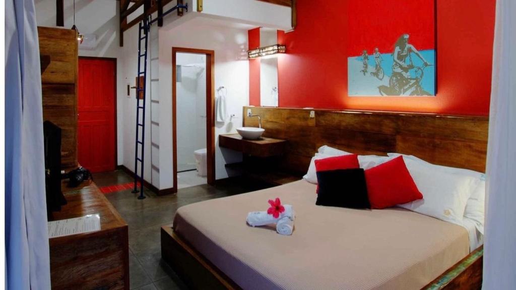 Cama ou camas em um quarto em Pousada Arágua