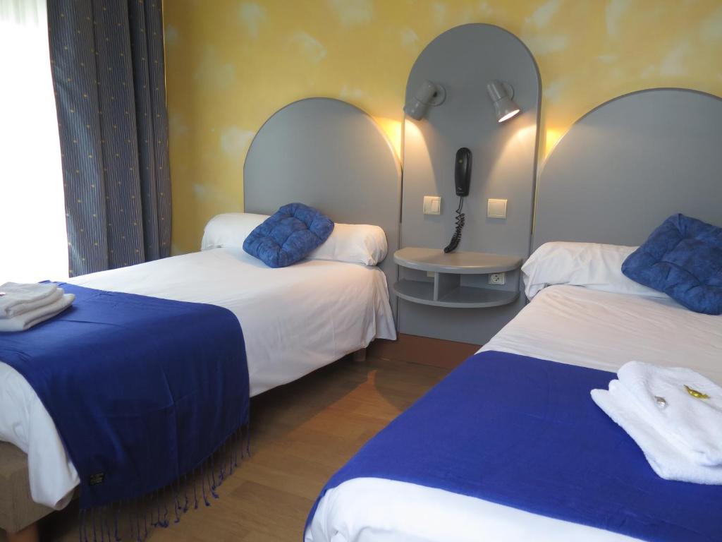 Postel nebo postele na pokoji v ubytování Auberge Champenoise