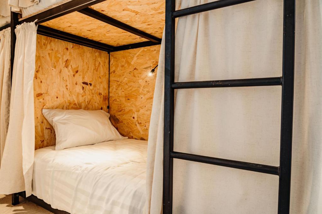 Postel nebo postele na pokoji v ubytování Kualena Hostal