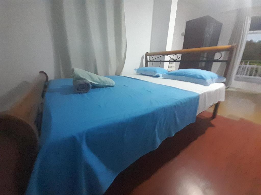 Postel nebo postele na pokoji v ubytování La Belle du Sud
