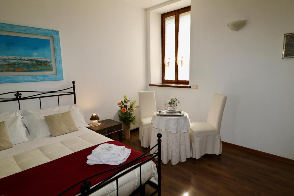 Postel nebo postele na pokoji v ubytování Casa Pellis