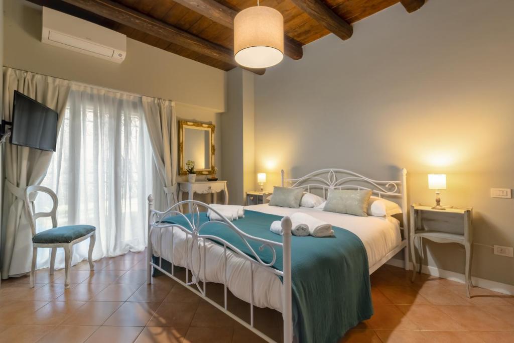 Postel nebo postele na pokoji v ubytování Casa dei Fiori