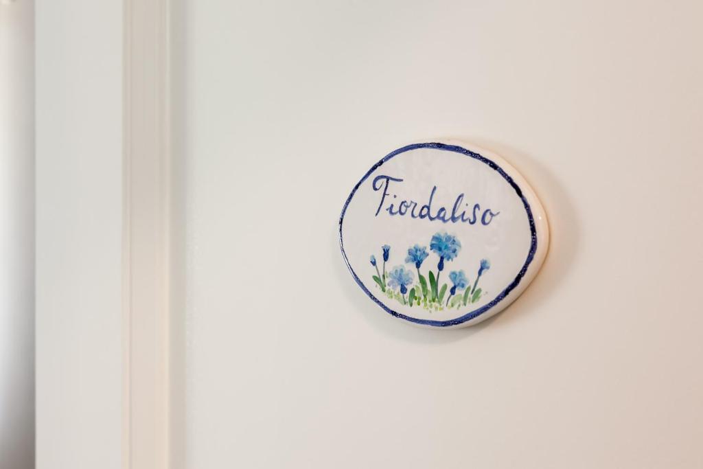 Certifikát, hodnocení, plakát nebo jiný dokument vystavený v ubytování Casa dei Fiori