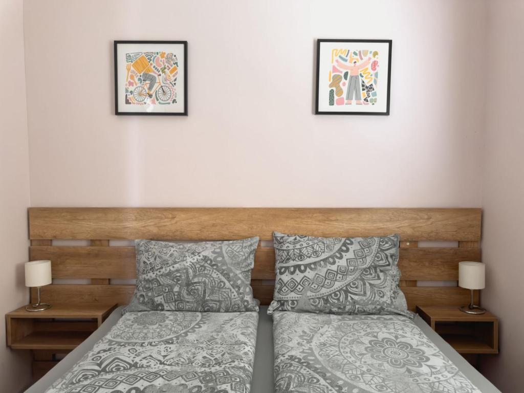 Postel nebo postele na pokoji v ubytování Apartmani AquaMarine