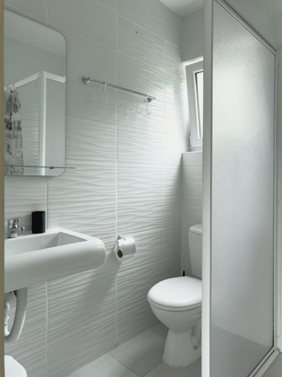Koupelna v ubytování Apartmani AquaMarine