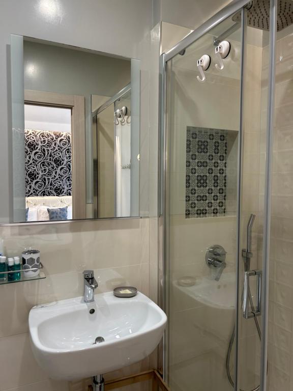 Koupelna v ubytování Alba rooms