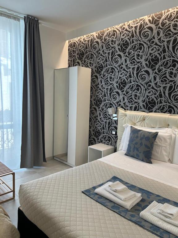 Postel nebo postele na pokoji v ubytování Alba rooms