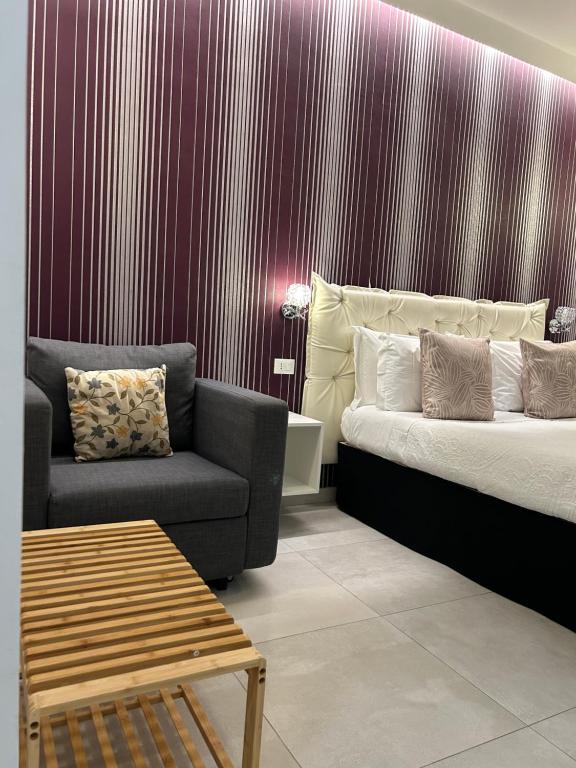 Posezení v ubytování Alba rooms