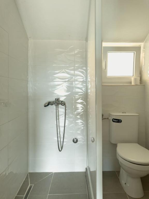 Koupelna v ubytování Apartmani AquaMarine