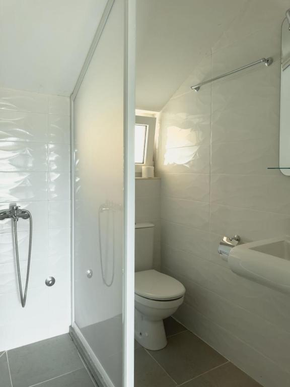 Koupelna v ubytování Apartmani AquaMarine