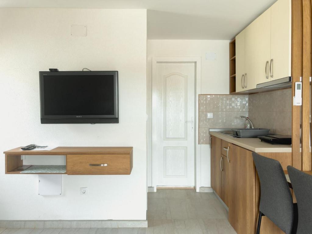 Kuchyň nebo kuchyňský kout v ubytování Apartmani AquaMarine