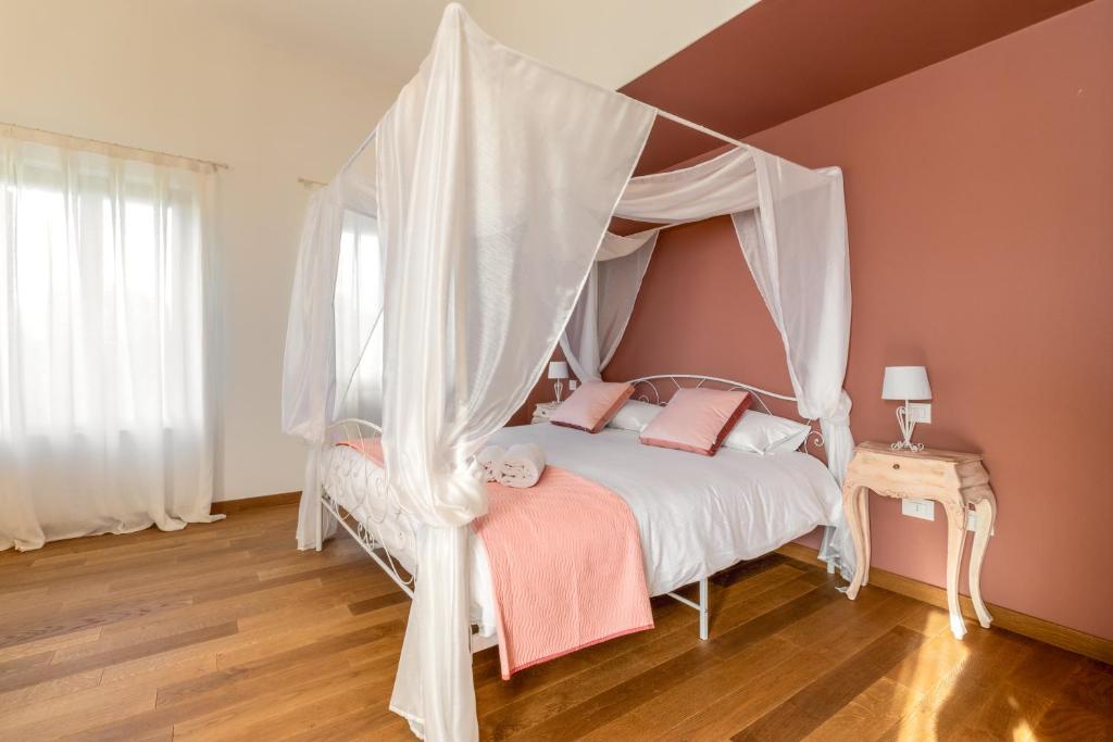 Postel nebo postele na pokoji v ubytování Casa dei Fiori