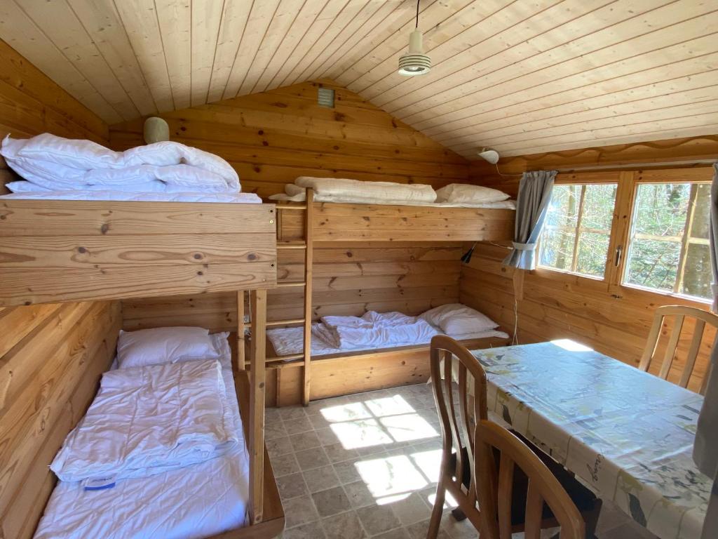 Postel nebo postele na pokoji v ubytování Krogager Primitiv Camping - Krogen