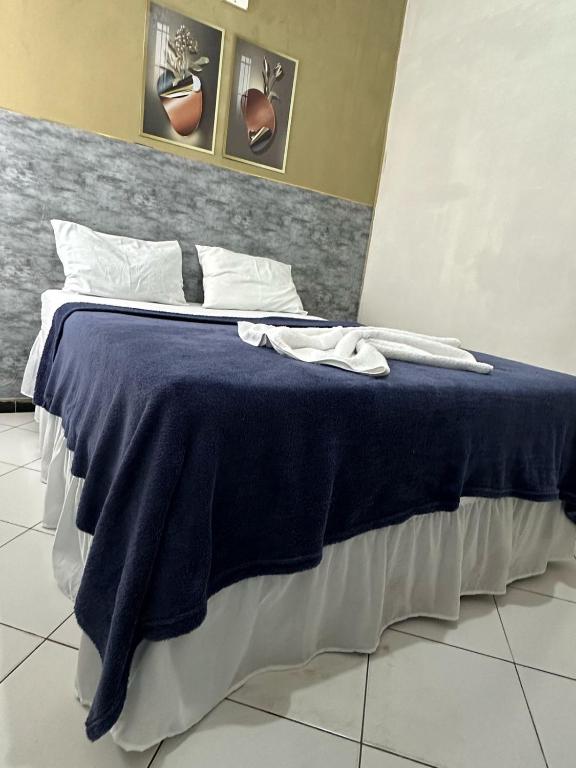 Postel nebo postele na pokoji v ubytování Lua Hotel
