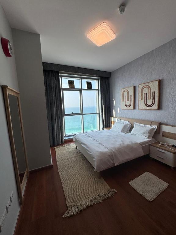 Voodi või voodid majutusasutuse Ocean View Luxury Suites toas