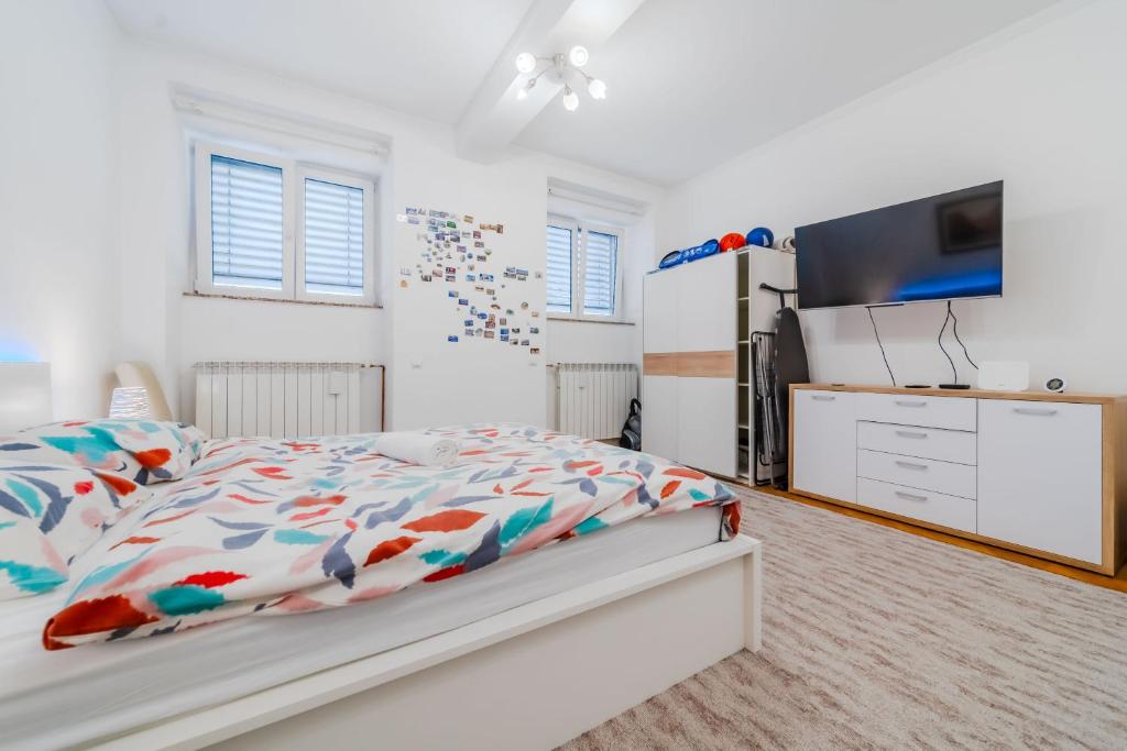 Postel nebo postele na pokoji v ubytování Work and Play Apartment