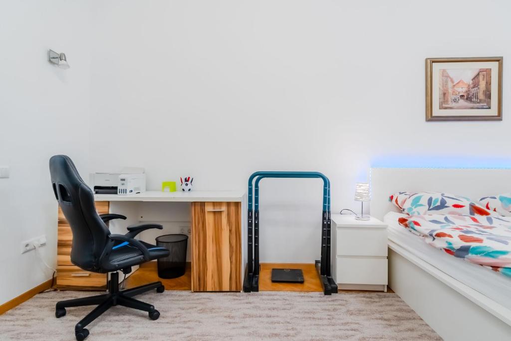 Posezení v ubytování Work and Play Apartment