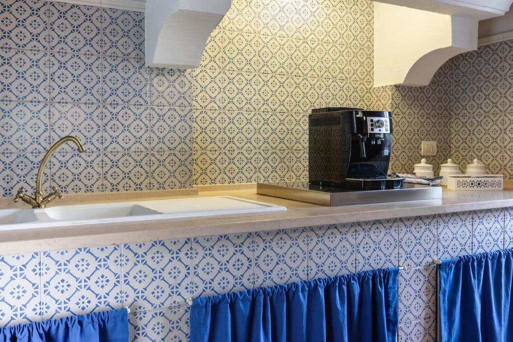 Kuchyň nebo kuchyňský kout v ubytování Casa dei Fiori