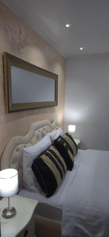 Postel nebo postele na pokoji v ubytování Wellness Villa Mantra Bačka Topola
