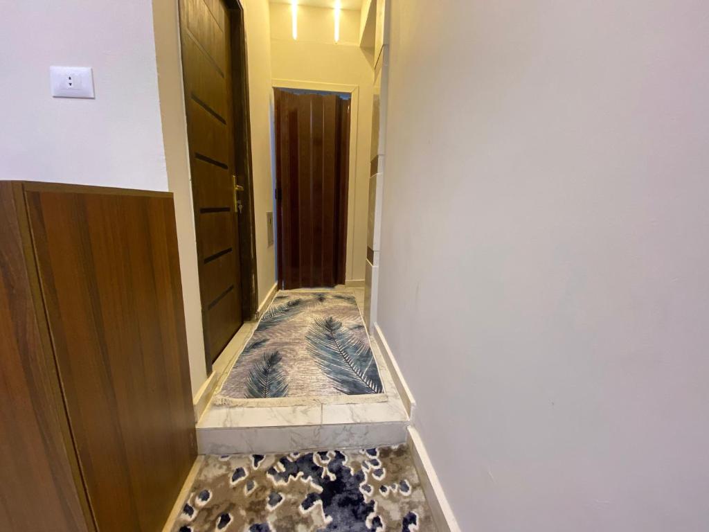 Postel nebo postele na pokoji v ubytování Isis Pyramids View Inn