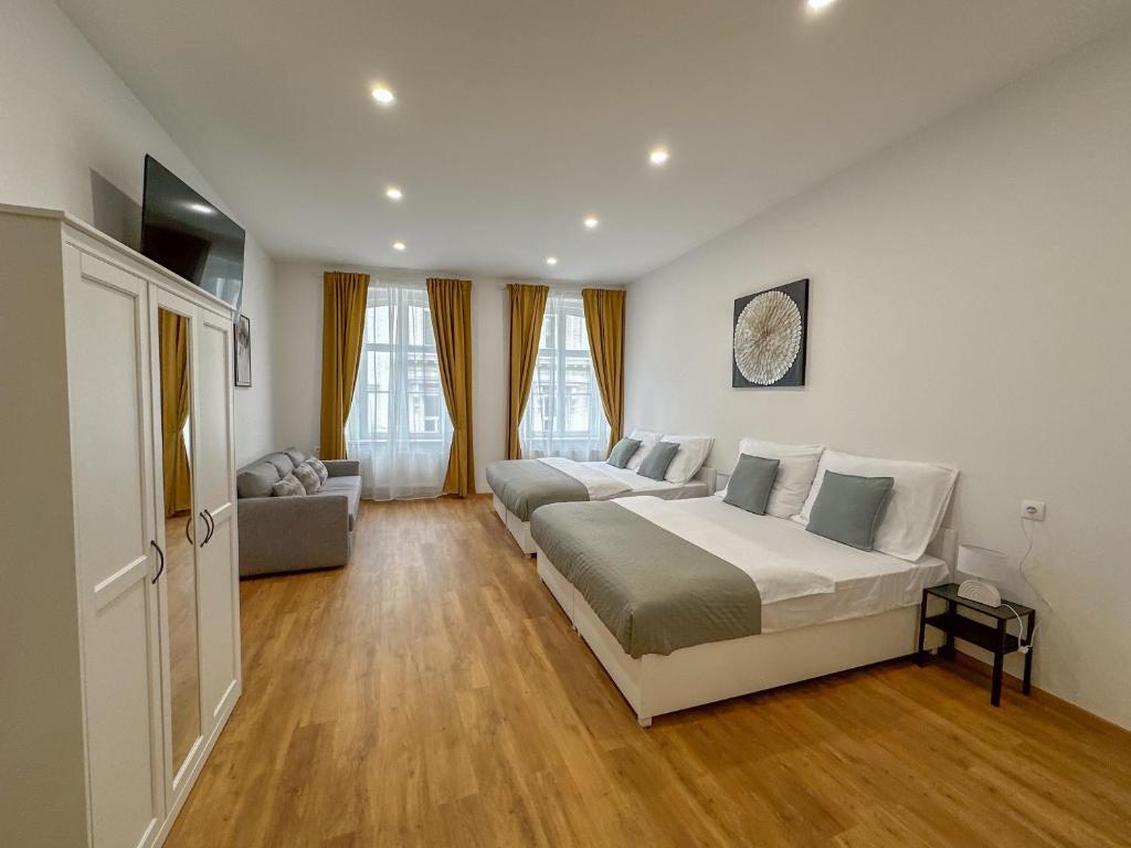 Cama o camas de una habitación en Krakovka Residence