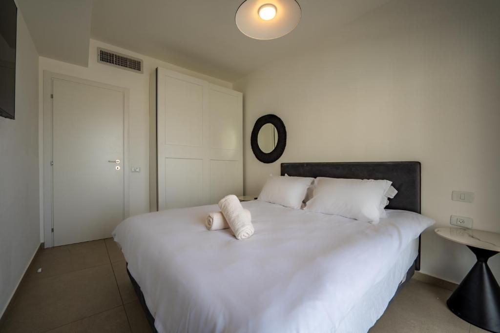 Ein Bett oder Betten in einem Zimmer der Unterkunft Valencia Apartment - By Harim