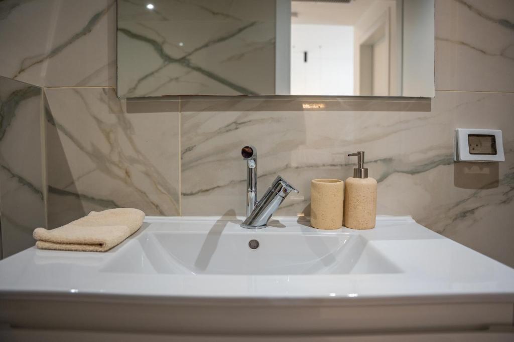 Ein Badezimmer in der Unterkunft Valencia Apartment - By Harim