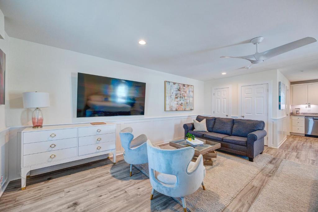 a living room with a couch and a table at 201 King Pet Friendly, 2nd Floor Barefoot in Surf City