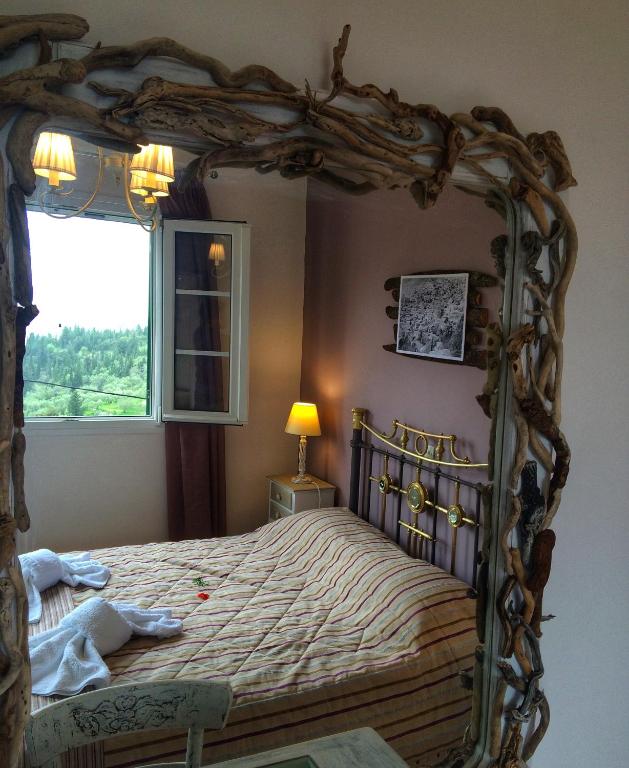 A bed or beds in a room at Villa Del Sol