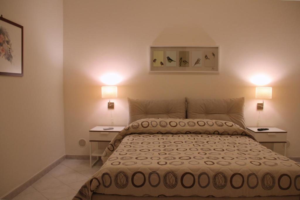 Postel nebo postele na pokoji v ubytování B&B Darsena