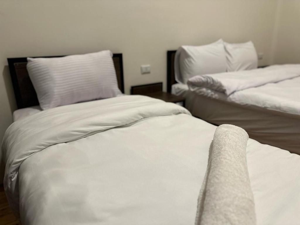 Postel nebo postele na pokoji v ubytování havana hotel