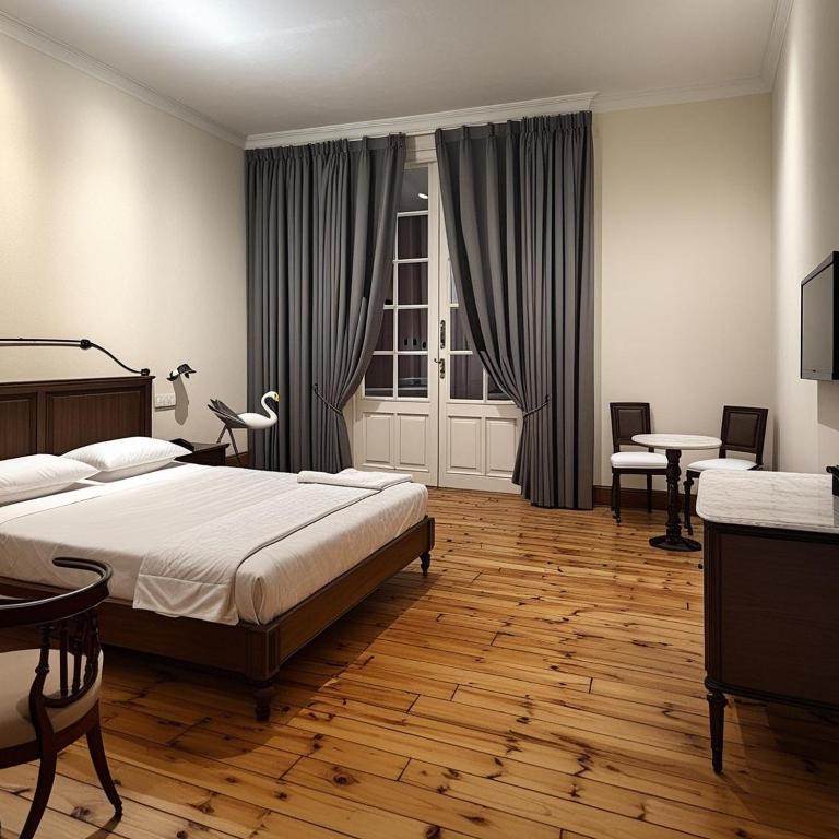 Postel nebo postele na pokoji v ubytování havana hotel