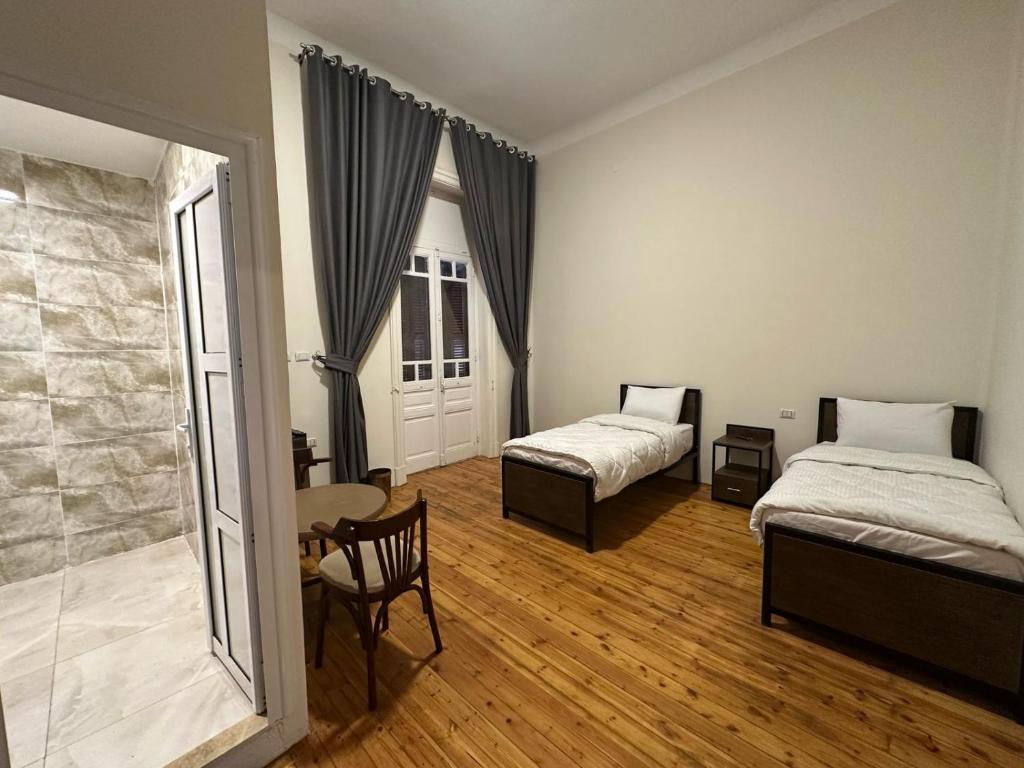 Postel nebo postele na pokoji v ubytování havana hotel