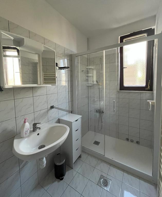 Koupelna v ubytování Apartma Laganini