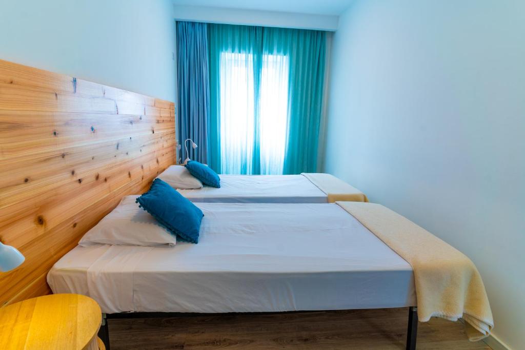 Postel nebo postele na pokoji v ubytování Hostel AzorAzul - Pool & Suite
