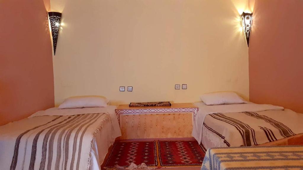 Cama o camas de una habitación en Tigmmi alhana
