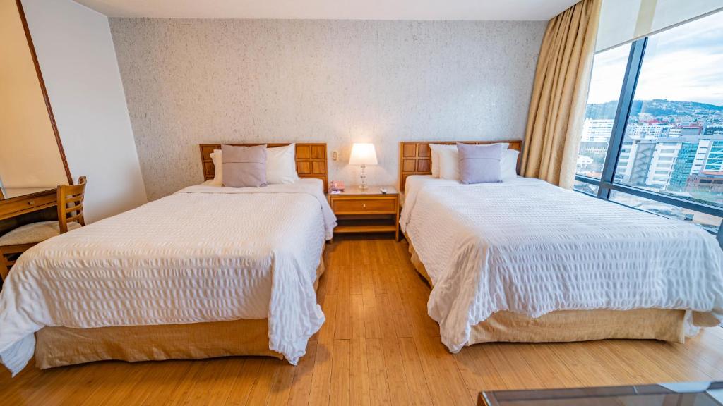 Postel nebo postele na pokoji v ubytování Hotel Rio Amazonas