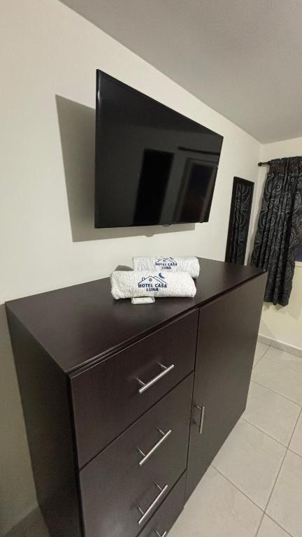 TV a/nebo společenská místnost v ubytování Hotel Casa Luna
