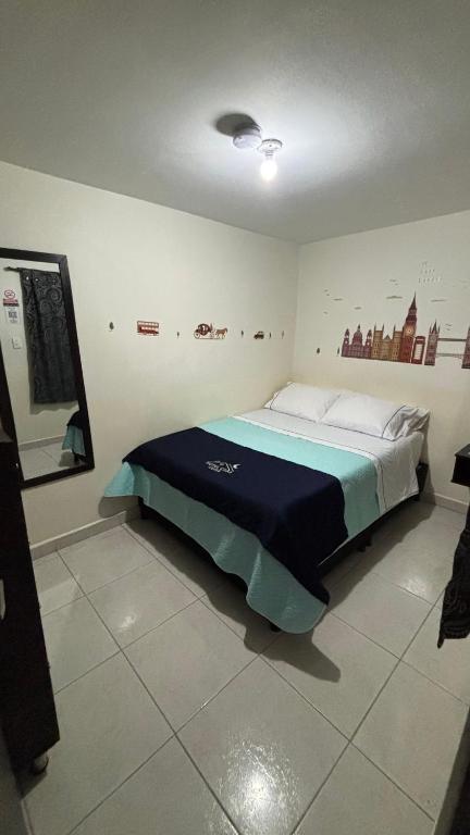 Postel nebo postele na pokoji v ubytování Hotel Casa Luna