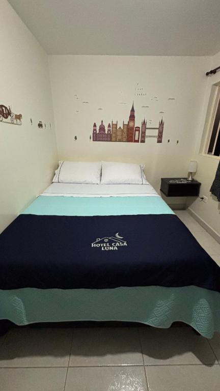 Postel nebo postele na pokoji v ubytování Hotel Casa Luna