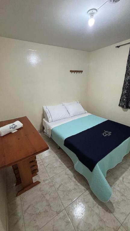 Postel nebo postele na pokoji v ubytování Hotel Casa Luna