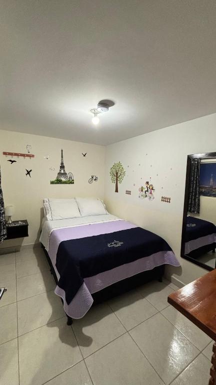 Postel nebo postele na pokoji v ubytování Hotel Casa Luna