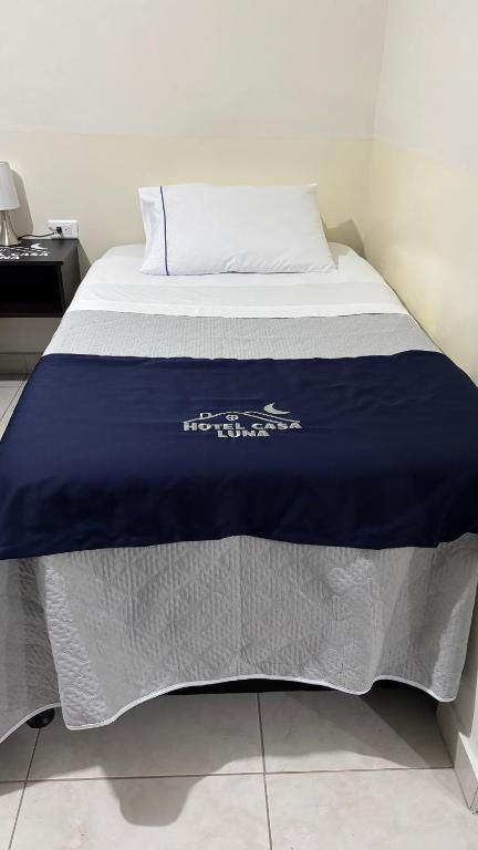 Postel nebo postele na pokoji v ubytování Hotel Casa Luna
