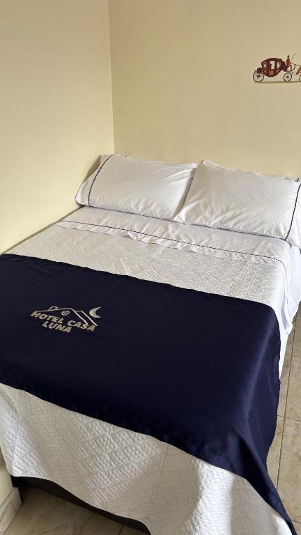 Postel nebo postele na pokoji v ubytování Hotel Casa Luna