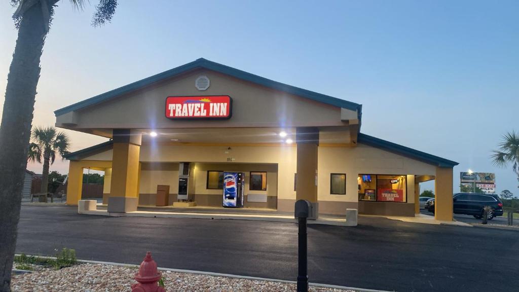 a pepsi max gas station with a sign on it at Travelinn in Unadilla