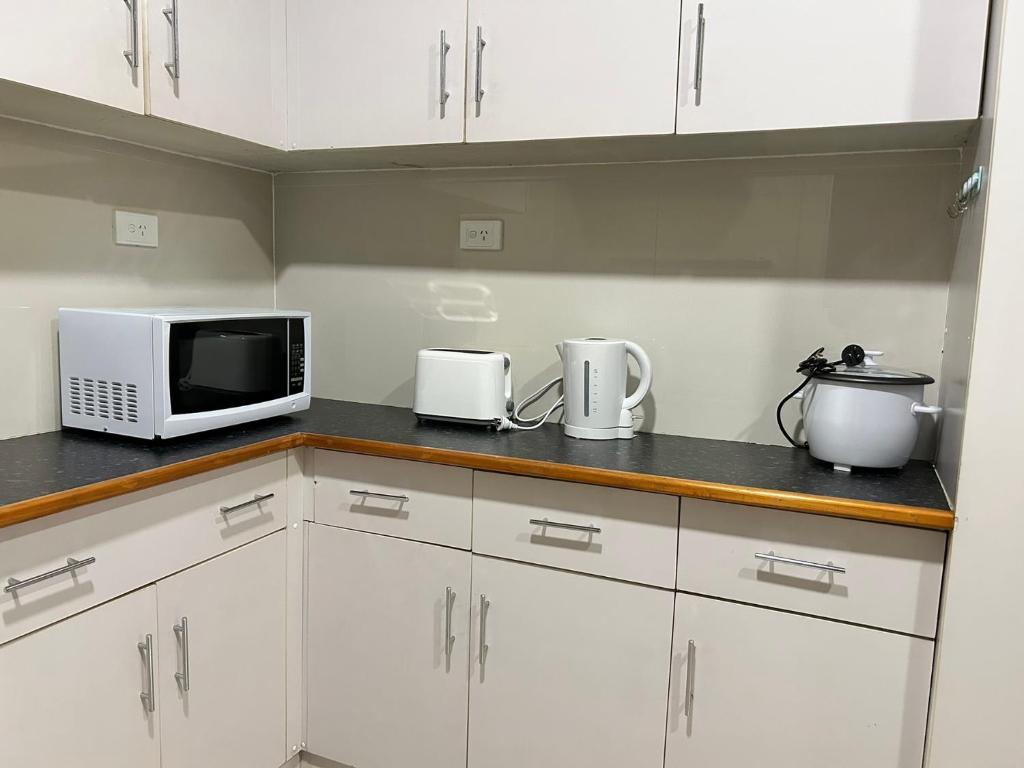 Kuchyň nebo kuchyňský kout v ubytování Zenith by Proxima Homes