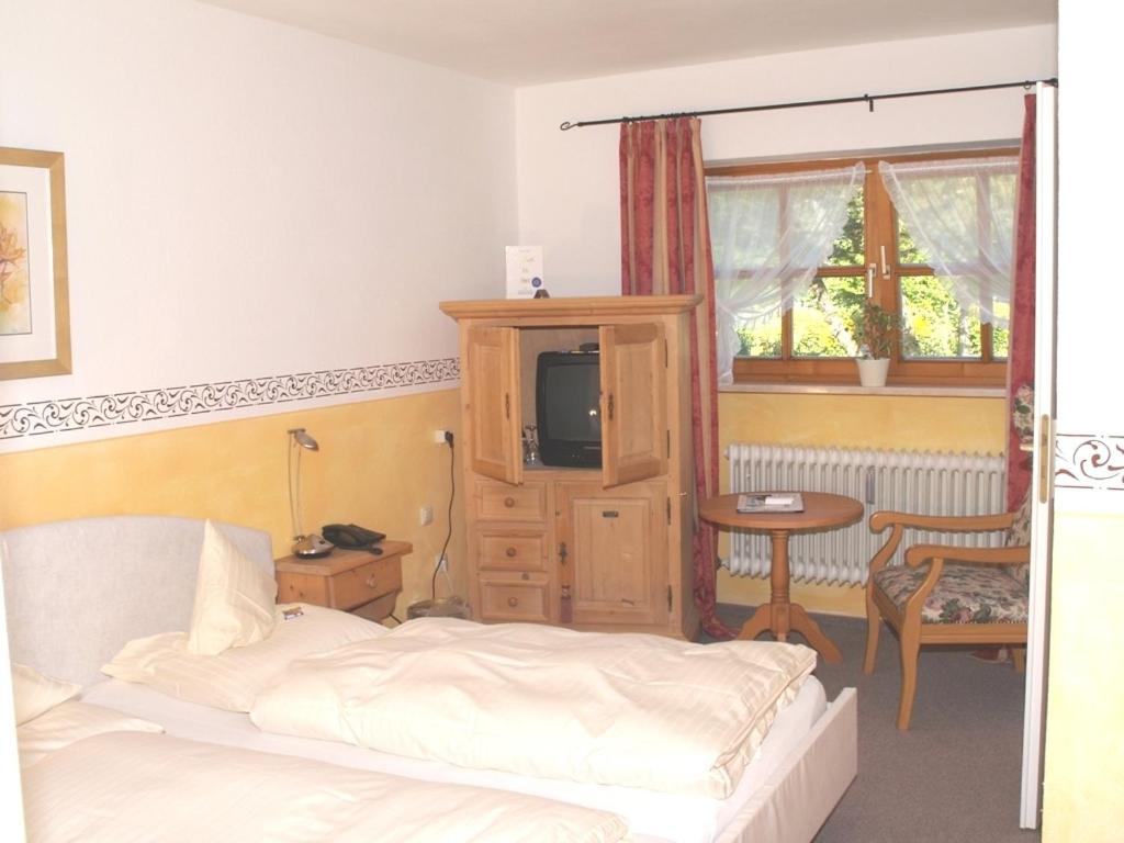 Postel nebo postele na pokoji v ubytování Eichenhof