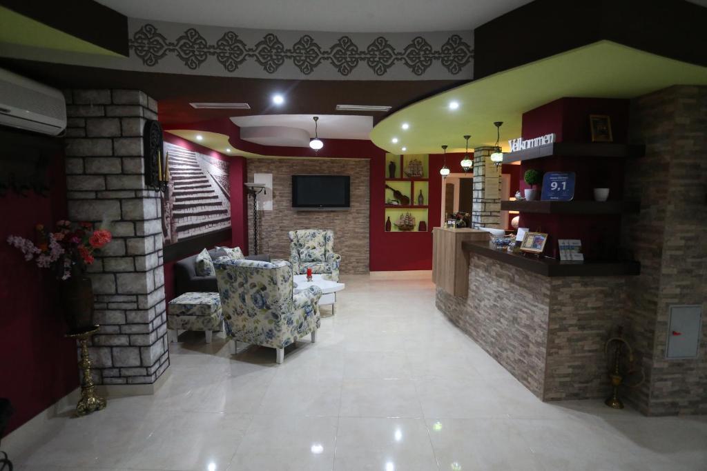Kuchyň nebo kuchyňský kout v ubytování Hotel Villa Nadin