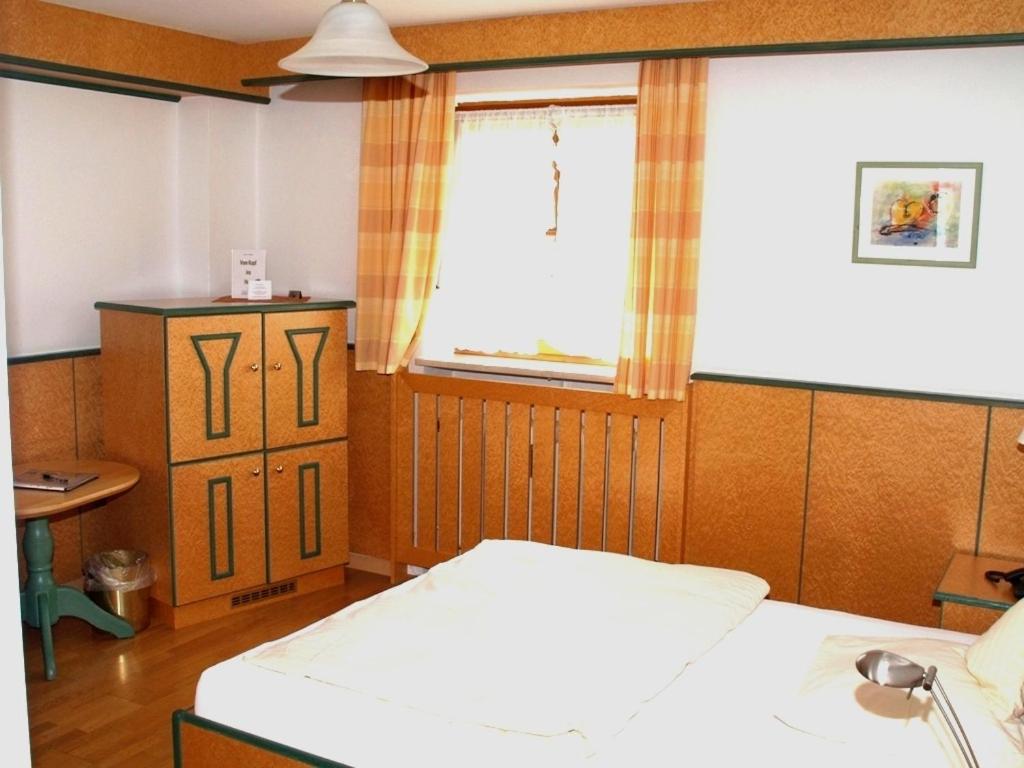 Postel nebo postele na pokoji v ubytování Eichenhof